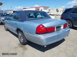1999 Mercury Grand Marquis LS with VIN 2MEFM75WXXX629568, listed as a IAAI auction lot 41937347 with 166,100 mi miles. Bid and sale history available at carsss.com. Image 3.