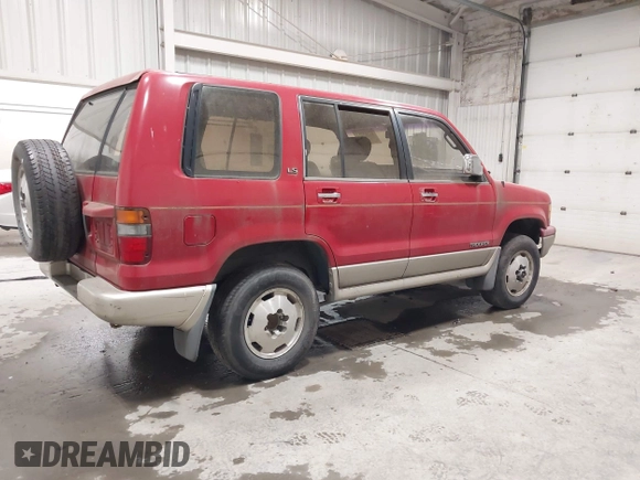 1994 Isuzu Trooper with VIN JACDH58WXR7906496, listed as a IAAI auction lot 42355985 with 203,592 mi miles and . Bid and sale history available at DreamBid. Image 4.