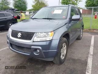 2006 Suzuki Grand Vitara XSport with VIN JS3TD944564103016, listed as a IAAI auction lot 42170763 with 127,442 mi miles and . Bid and sale history available at DreamBid. Image 2.