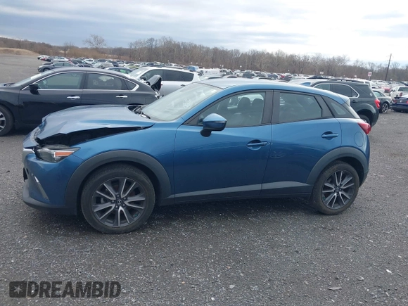 2018 Mazda CX-3 Touring with VIN JM1DKFC78J0322460, listed as a IAAI auction lot 41730662 with 58,841 mi miles. Bid and sale history available at carsss.com. Image 15.