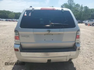 2009 Mercury Mariner Premier z VIN 4M2CU87G19KJ14006, wystawiony jako Copart lot #63615445 z przebiegiem 216 941 mil mil oraz Szkoda całkowita • Salvage title. Historia ofert i sprzedaży dostępna na DreamBid. Obrazek 6.