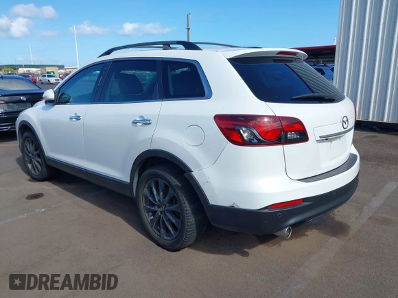2015 Mazda CX-9 Grand Touring с VIN JM3TB2DA7F0456065, выставлен на аукционе IAAI как лот 42328501 с пробегом 116 951 миль миль и . История ставок и продаж доступна на DreamBid. Изображение 3.