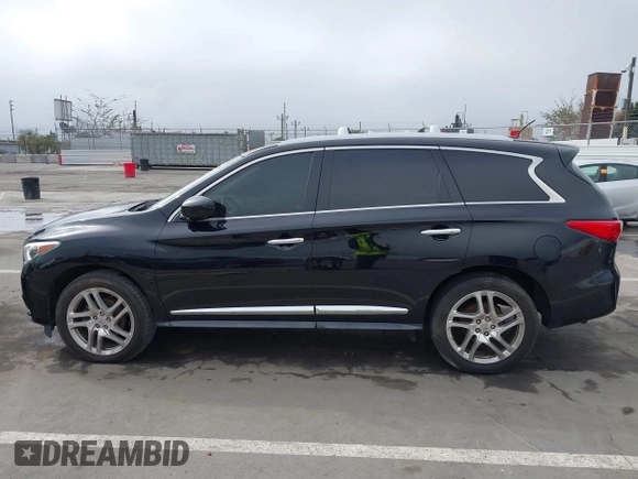 2013 Infiniti JX35 with VIN 5N1AL0MN7DC310972, listed as a IAAI auction lot 41859376 with 117,679 mi miles. Bid and sale history available at carsss.com. Image 14.