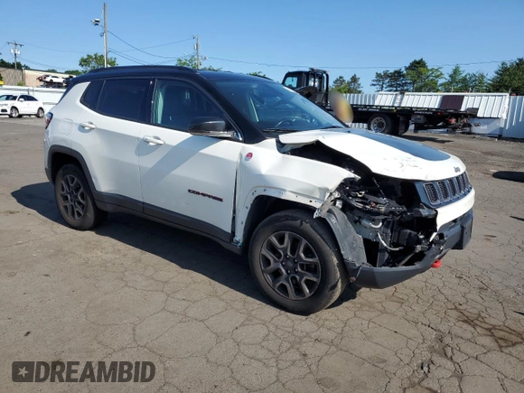 2019 Jeep Compass Trailhawk with VIN 3C4NJDDBXKT671249, listed as a Copart auction lot 58927225 with Not provided miles and Salvage title. Bid and sale history available at DreamBid. Image 4.