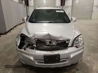 2012 Chevrolet Captiva Sport LTZ with VIN 3GNFL4E5XCS609095, listed as a Copart auction lot 77334734 with 163,078 mi miles and Salvage Title. Bid and sale history available at DreamBid. Image 5.
