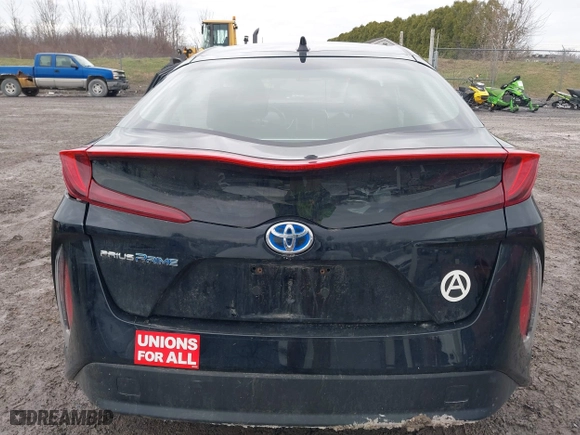 2021 Toyota Prius Prime LE with VIN JTDKAMFP2M3165859, listed as a IAAI auction lot 41943098 with 20,306 mi miles. Bid and sale history available at carsss.com. Image 17.