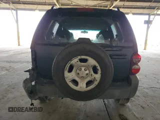 2005 Jeep Liberty Sport with VIN 1J4GK48K45W664323, listed as a Copart auction lot 53851855 with 323,695 mi miles and Salvage Title. Bid and sale history available at DreamBid. Image 6.