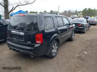 2013 Honda Pilot Touring with VIN 5FNYF4H9XDB045255, listed as a IAAI auction lot 42012812 with 209,956 mi miles. Bid and sale history available at carsss.com. Image 4.
