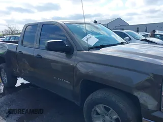 2014 Chevrolet Silverado 1500 LT with VIN 1GCRCREC6EZ413419, listed as a IAAI auction lot 41983067 with 168,011 mi miles and . Bid and sale history available at DreamBid. Image 13.