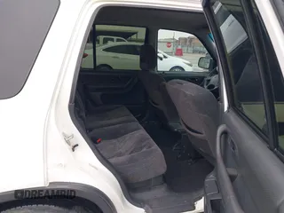 2001 Honda CR-V LX with VIN JHLRD28431S006396, listed as a IAAI auction lot 41968207 with 230,018 mi miles. Bid and sale history available at carsss.com. Image 8.