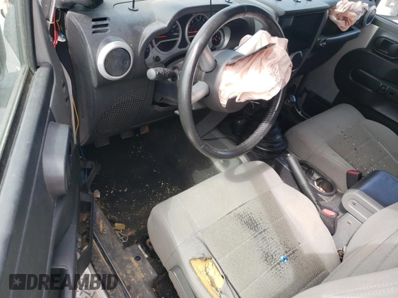 2008 Jeep Wrangler Sahara with VIN 1J4FA54148L561961, listed as a Copart auction lot 50770895 with 126,516 mi miles and Salvage title. Bid and sale history available at DreamBid. Image 8.