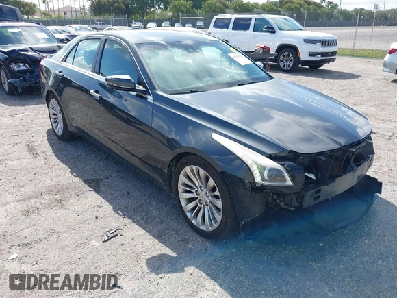 2014 Cadillac CTS Performance RWD with VIN 1G6AS5S36E0151499, listed as a IAAI auction lot 41945902 with 133,858 mi miles and . Bid and sale history available at DreamBid. Image 1.
