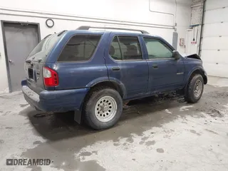 2003 Isuzu Rodeo with VIN 4S2CK58W634308515, listed as a IAAI auction lot 41843174 with 158,748 mi miles. Bid and sale history available at carsss.com. Image 4.