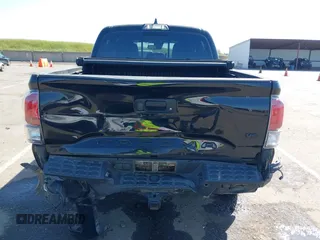2021 Toyota Tacoma SR z VIN 3TMCZ5AN3MM421868, wystawiony jako IAAI lot #42003665 z przebiegiem 39 380 mil mil oraz . Historia ofert i sprzedaży dostępna na DreamBid. Obrazek 16.