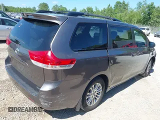 2012 Toyota Sienna XLE AAS with VIN 5TDYK3DC5CS259216, listed as a IAAI auction lot 42143551 with 219,957 mi miles and . Bid and sale history available at DreamBid. Image 4.