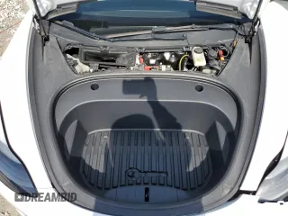 2023 Tesla Model 3 z VIN 5YJ3E1EAXPF422956, wystawiony jako Copart lot #52500285 z przebiegiem 24 082 mil mil oraz Nie do naprawy • Non repairable. Historia ofert i sprzedaży dostępna na DreamBid. Obrazek 11.