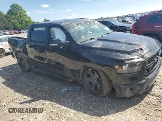 2019 Ram 1500 Big Horn with VIN 1C6SRFFT0KN870198, listed as a Copart auction lot 55661905 with 103,716 mi miles and Salvage title. Bid and sale history available at DreamBid. Image 4.