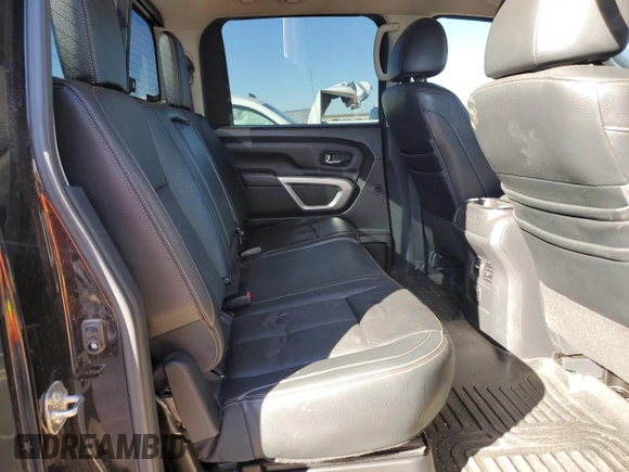 2017 Nissan Titan SL z VIN 1N6AA1E54HN554049, wystawiony jako Copart lot #81404094 z przebiegiem 97 811 mil mil oraz Czysty tytuł • Clean title. Historia ofert i sprzedaży dostępna na DreamBid. Obrazek 10.