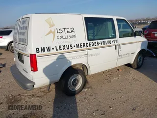 1999 Chevrolet Astro Cargo with VIN 1GCDM19W4XB141901, listed as a IAAI auction lot 41572036 with Not Provided miles. Bid and sale history available at carsss.com. Image 4.