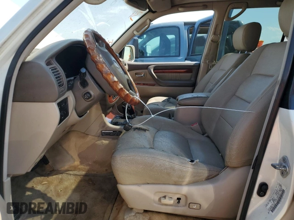 2000 Lexus LX 470 with VIN JT6HT00W2Y0106774, listed as a Copart auction lot 74762004 with Not Provided miles and Salvage Title. Bid and sale history available at DreamBid. Image 7.