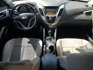2014 Hyundai Veloster with VIN KMHTC6AD0EU207850, listed as a Copart auction lot 46986695 with 138,024 mi miles and Salvage Title. Bid and sale history available at carsss.com. Image 8.