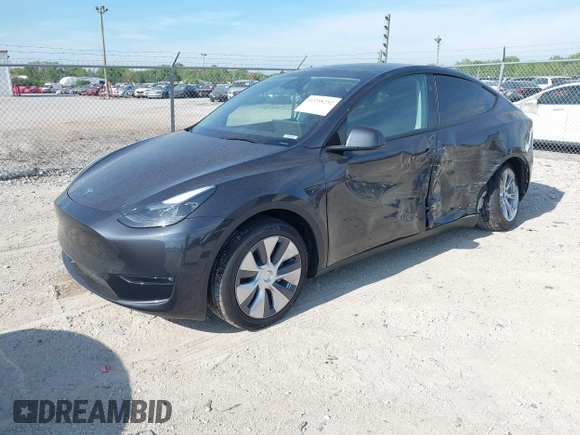 2024 Tesla Model Y Long Range z VIN 7SAYGDEE2RF992489, wystawiony jako IAAI lot #42258232 z przebiegiem 14 771 mil mil oraz . Historia ofert i sprzedaży dostępna na DreamBid. Obrazek 2.