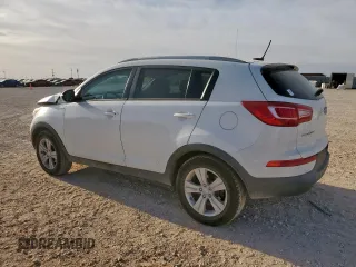2012 Kia Sportage LX z VIN KNDPBCA22C7261796, wystawiony jako Copart lot #57284425 z przebiegiem 133 383 mil mil oraz Szkoda całkowita • Salvage title. Historia ofert i sprzedaży dostępna na DreamBid. Obrazek 2.