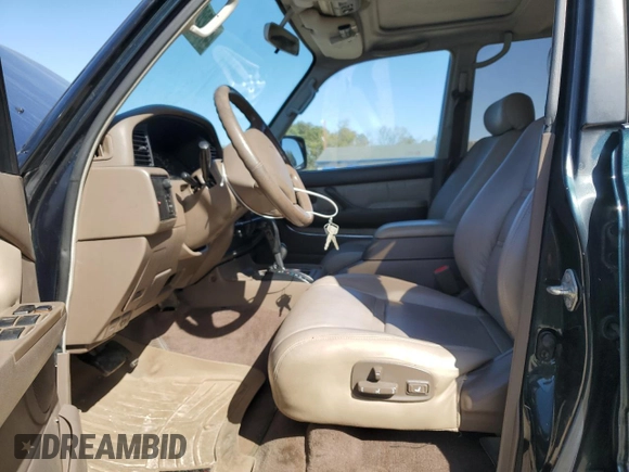 1995 Toyota Land Cruiser z VIN JT3DJ81W6S0106332, wystawiony jako Copart lot #47772055 z przebiegiem 214 499 mil mil oraz Szkoda całkowita • Salvage title. Historia ofert i sprzedaży dostępna na DreamBid. Obrazek 7.