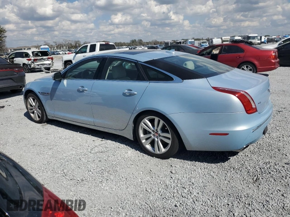 2014 Jaguar XJ with VIN SAJWA1CZ4E8V71167, listed as a Copart auction lot 43994545 with 69,682 mi miles and Salvage Title. Bid and sale history available at DreamBid. Image 2.
