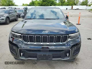 2023 Jeep Grand Cherokee Overland with VIN 1C4RJHDG0PC670537, listed as a Copart auction lot 56757285 with 24,735 mi miles and Salvage title. Bid and sale history available at DreamBid. Image 5.