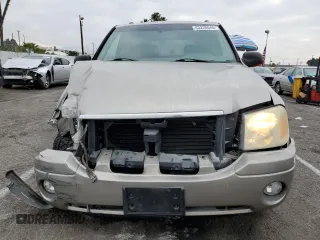2003 GMC Envoy SLE with VIN 1GKDS13S232236886, listed as a Copart auction lot 43220545 with 58,229 mi miles and Salvage Title. Bid and sale history available at carsss.com. Image 5.