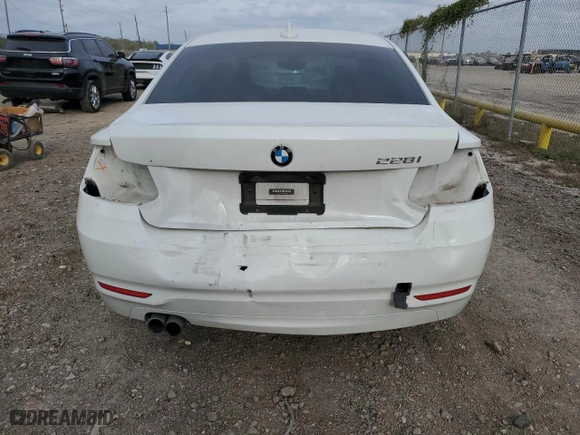 2014 BMW 2 Series 228i with VIN WBA1F5C50EV255830, listed as a Copart auction lot 82403254 with 69,286 mi miles and Salvage Title. Bid and sale history available at carsss.com. Image 6.