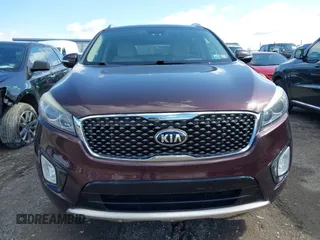 2016 Kia Sorento SX with VIN 5XYPKDA58GG002304, listed as a IAAI auction lot 41990332 with 132,025 mi miles. Bid and sale history available at carsss.com. Image 6.