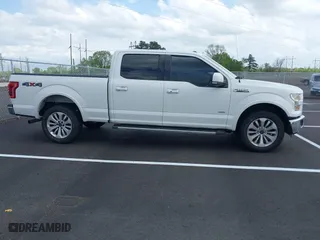 2015 Ford F-150 XLT w/HD Payload Pkg with VIN 1FTFW1EGXFFB88326, listed as a IAAI auction lot 41972016 with 204,767 mi miles. Bid and sale history available at carsss.com. Image 13.