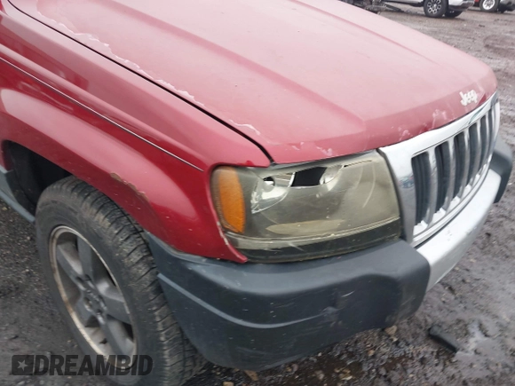 2004 Jeep Grand Cherokee Laredo with VIN 1J4GW48S94C151816, listed as a IAAI auction lot 41983332 with 151,227 mi miles. Bid and sale history available at carsss.com. Image 6.