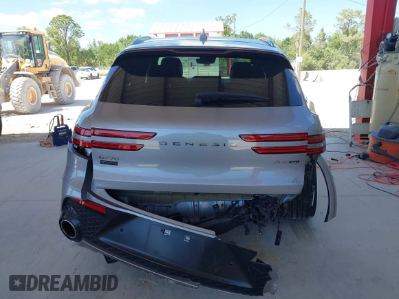 2023 Genesis GV70 Sport with VIN KMUMCDTC4PU098990, listed as a IAAI auction lot 42039386 with 32,090 mi miles and . Bid and sale history available at DreamBid. Image 6.