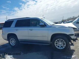 2019 GMC Yukon SLT with VIN 1GKS1BKC5KR277478, listed as a IAAI auction lot 41632624 with 86,770 mi miles. Bid and sale history available at carsss.com. Image 14.