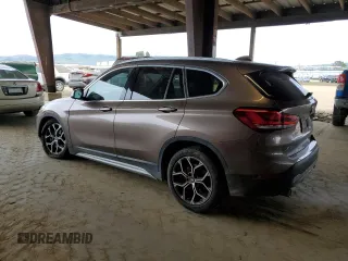 2020 BMW X1 xDrive28i with VIN WBXJG9C05L5R40935, listed as a Copart auction lot 47145335 with 46,554 mi miles and Salvage Title. Bid and sale history available at carsss.com. Image 2.