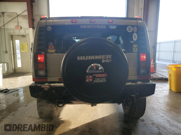2003 Hummer H2 with VIN 5GRGN23U53H101713, listed as a Copart auction lot 85216034 with 189,549 mi miles and Non Repairable. Bid and sale history available at carsss.com. Image 6.