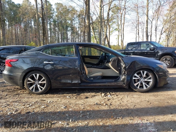 2017 Nissan Maxima SV z VIN 1N4AA6AP9HC399703, wystawiony jako IAAI lot #41858782 z przebiegiem 89 131 mil mil oraz . Historia ofert i sprzedaży dostępna na DreamBid. Obrazek 13.