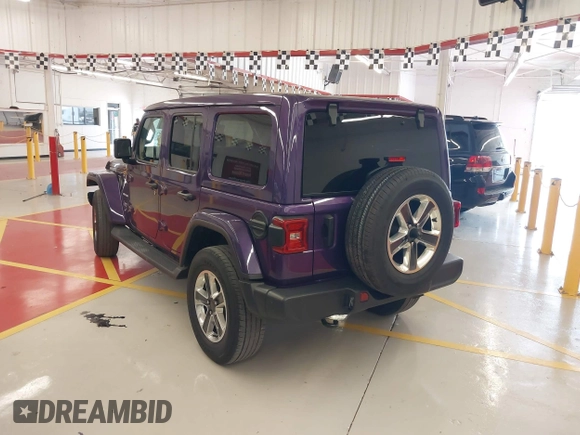 2023 Jeep Wrangler High Altitude z VIN 1C4HJXEN9PW560958, wystawiony jako IAAI lot #42393559 z przebiegiem 35 981 mil mil oraz . Historia ofert i sprzedaży dostępna na DreamBid. Obrazek 3.