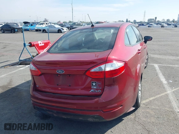 2015 Ford Fiesta SE with VIN 3FADP4BJ9FM113760, listed as a IAAI auction lot 41647960 with 122,868 mi miles. Bid and sale history available at carsss.com. Image 4.