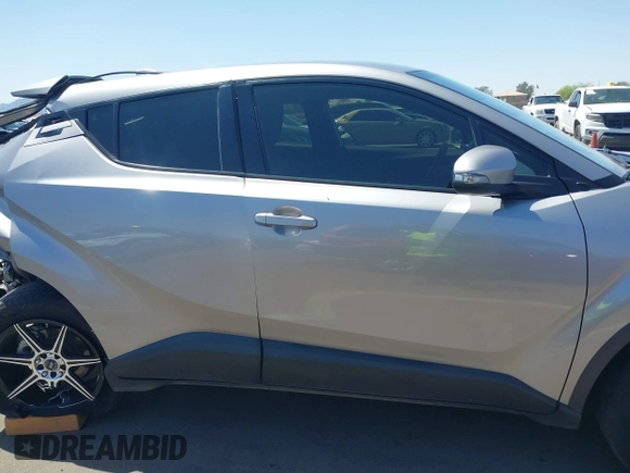 2020 Toyota C-HR LE with VIN JTNKHMBX4L1088502, listed as a IAAI auction lot 41982312 with 69,160 mi miles and . Bid and sale history available at DreamBid. Image 13.