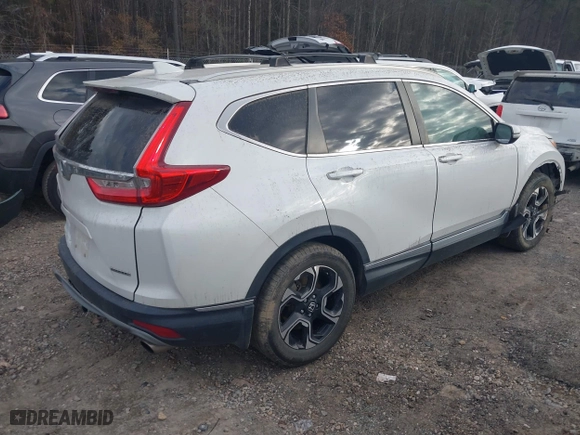 2019 Honda CR-V Touring with VIN 2HKRW1H90KH505234, listed as a IAAI auction lot 41152731 with 107,293 mi miles. Bid and sale history available at carsss.com. Image 4.