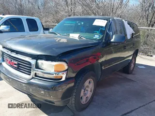 2003 GMC Yukon SLT with VIN 1GKEC13V23R135379, listed as a IAAI auction lot 41637458 with 236,134 mi miles. Bid and sale history available at carsss.com. Image 2.