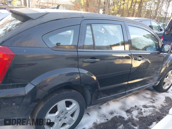2009 Dodge Caliber SXT with VIN 1B3HB48A89D118869, listed as a IAAI auction lot 41315552 with 198,986 mi miles and . Bid and sale history available at DreamBid. Image 13.