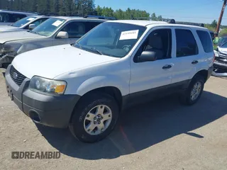 2007 Ford Escape XLT with VIN 1FMYU03127KC05177, listed as a IAAI auction lot 42199281 with 144,846 mi miles and . Bid and sale history available at DreamBid. Image 2.