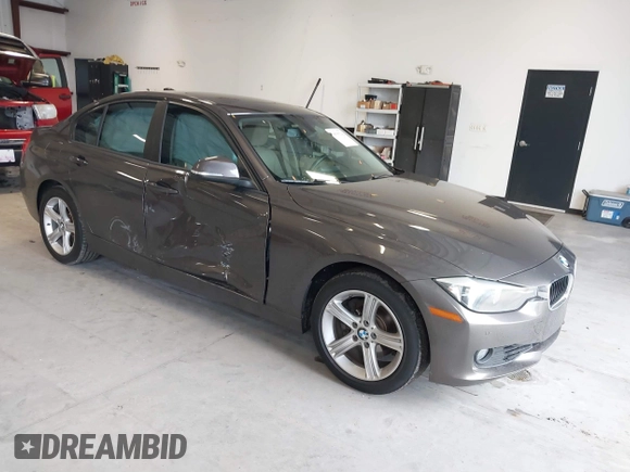 2015 BMW 3 Series 328i with VIN WBA3A5C57FF609734, listed as a IAAI auction lot 41392336 with 121,378 mi miles. Bid and sale history available at carsss.com. Image 1.