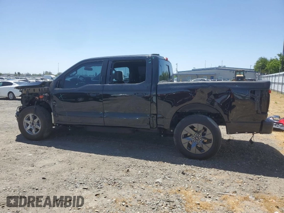 2023 Ford F-150 Lightning Pro with VIN 1FTVW1EV1PWG17333, listed as a Copart auction lot 57904025 with 21,173 mi miles and Salvage title. Bid and sale history available at DreamBid. Image 2.