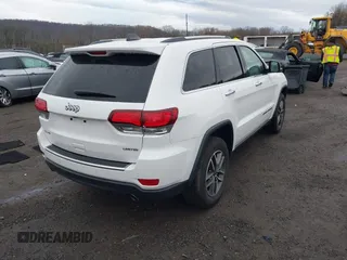 2021 Jeep Grand Cherokee 80th Anniversary with VIN 1C4RJFBG1MC537952, listed as a IAAI auction lot 41951647 with 39,744 mi miles and . Bid and sale history available at DreamBid. Image 4.